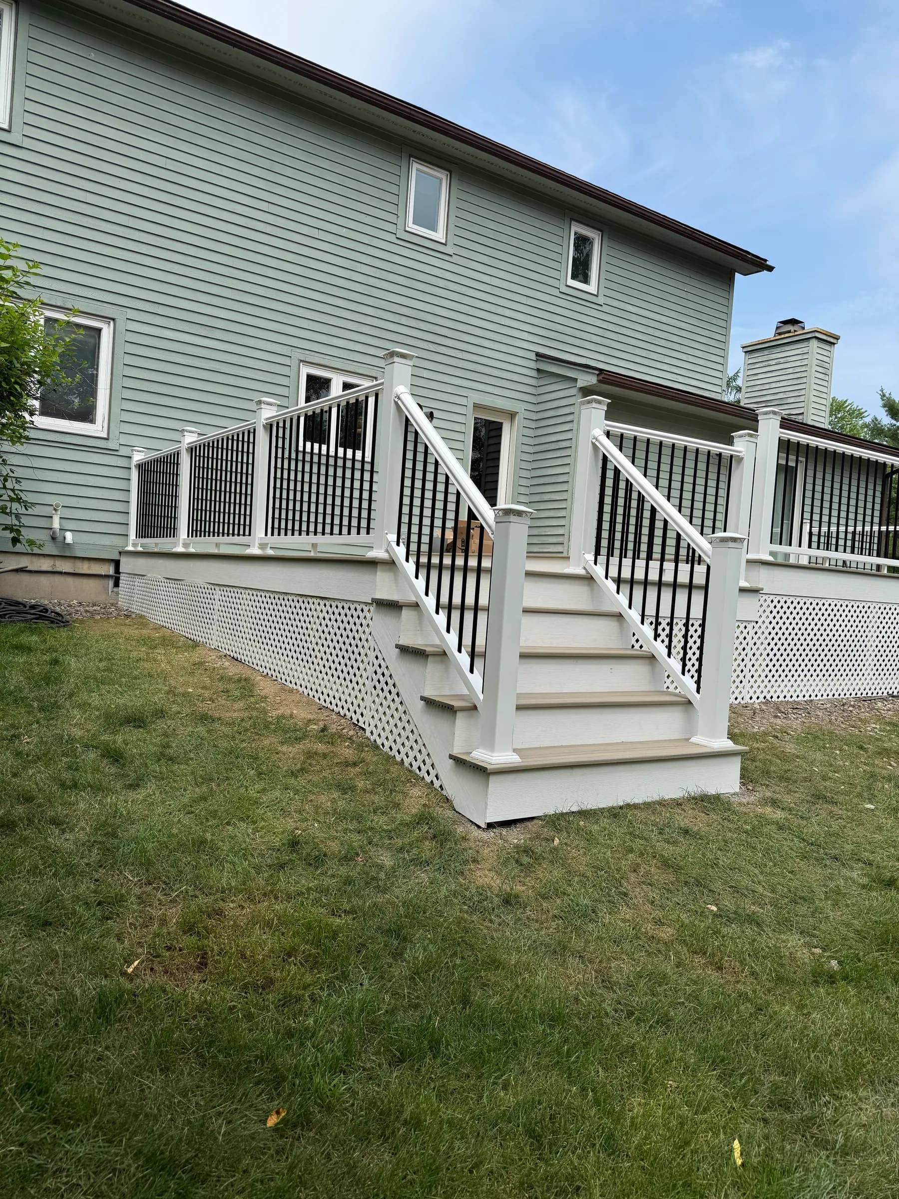 Full view of composite deck with white stairs