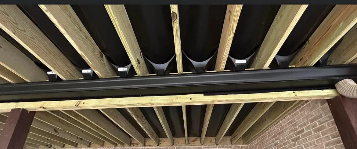 Under-deck framing with beams and drainage system