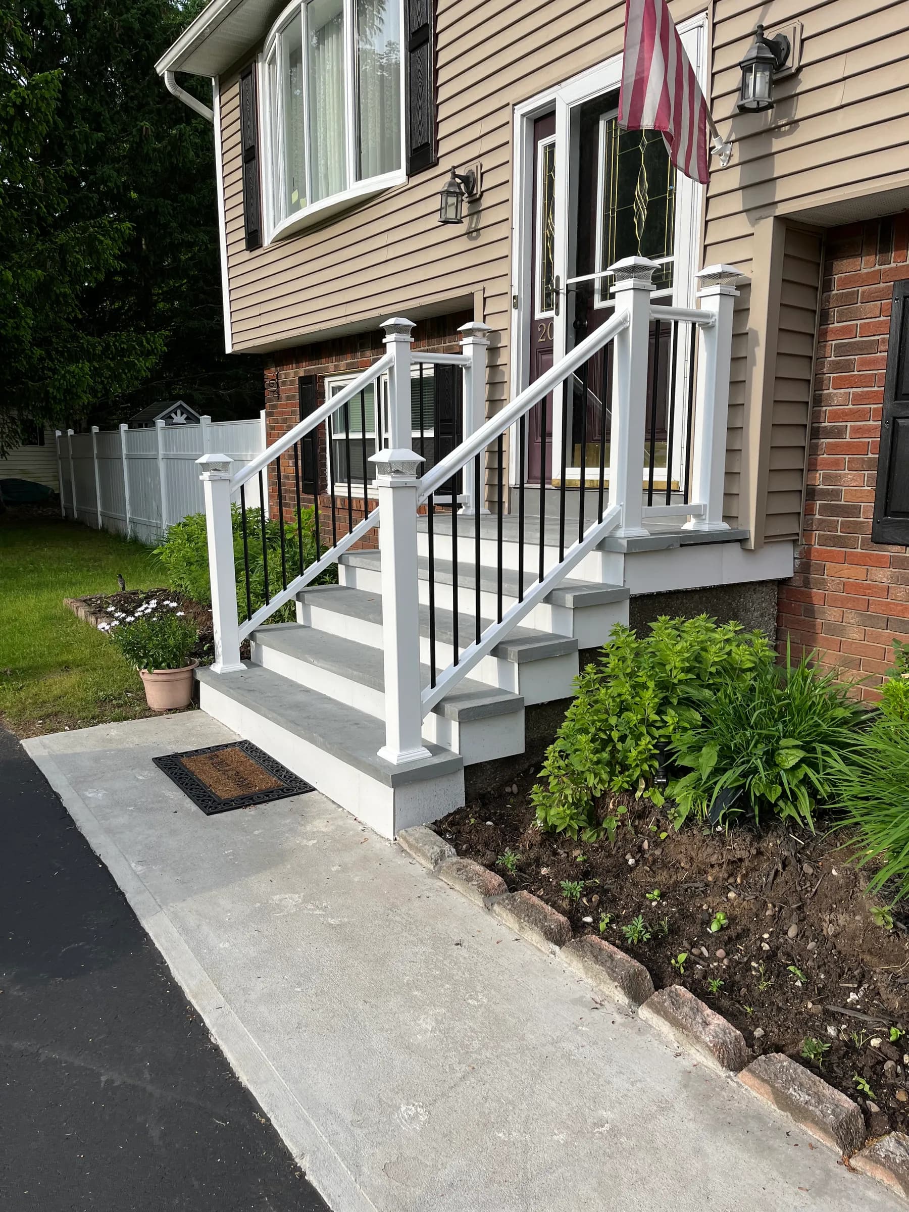 White railing front porch with black balusters
