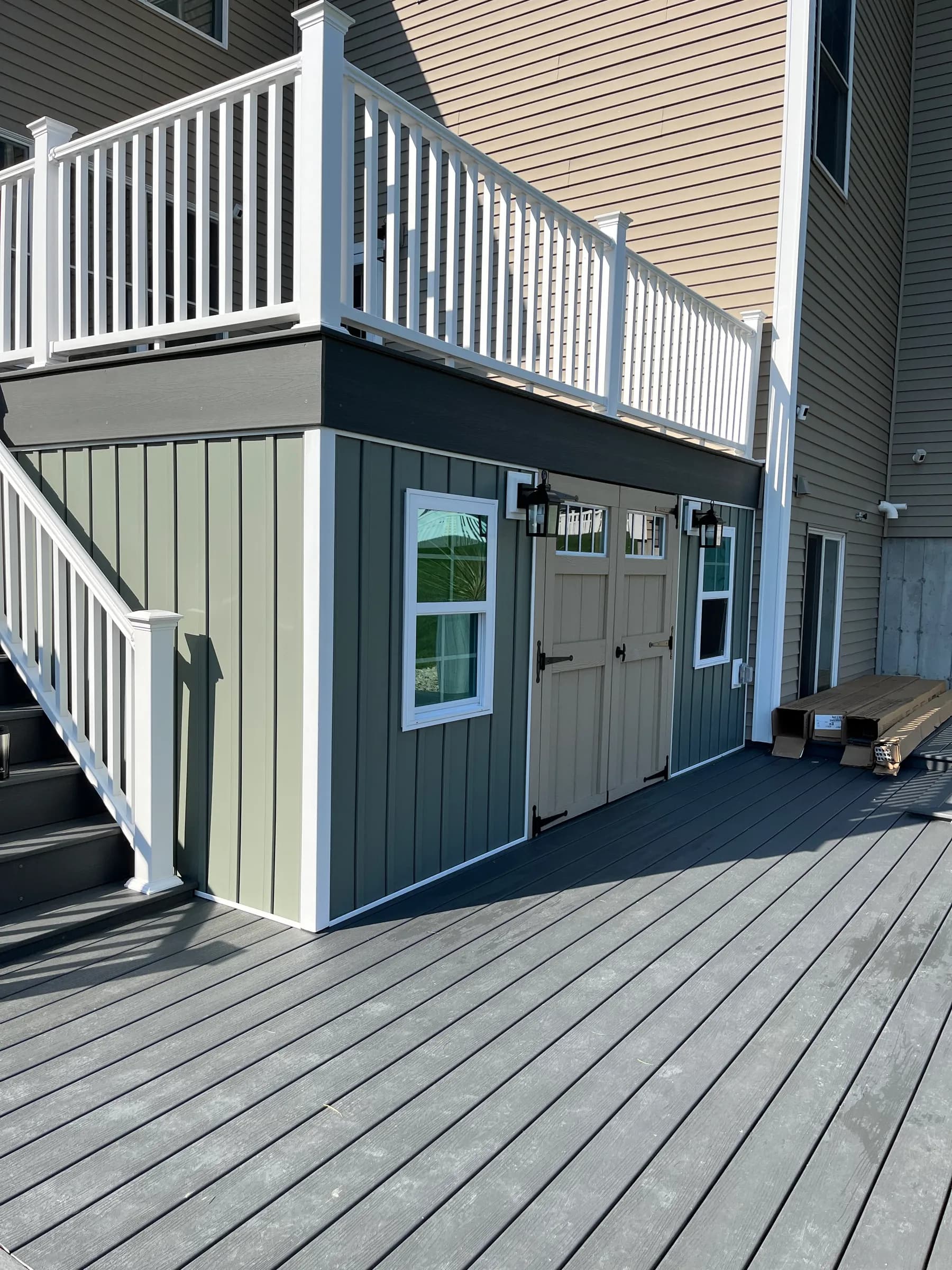 Side view of two-tone deck with pergola