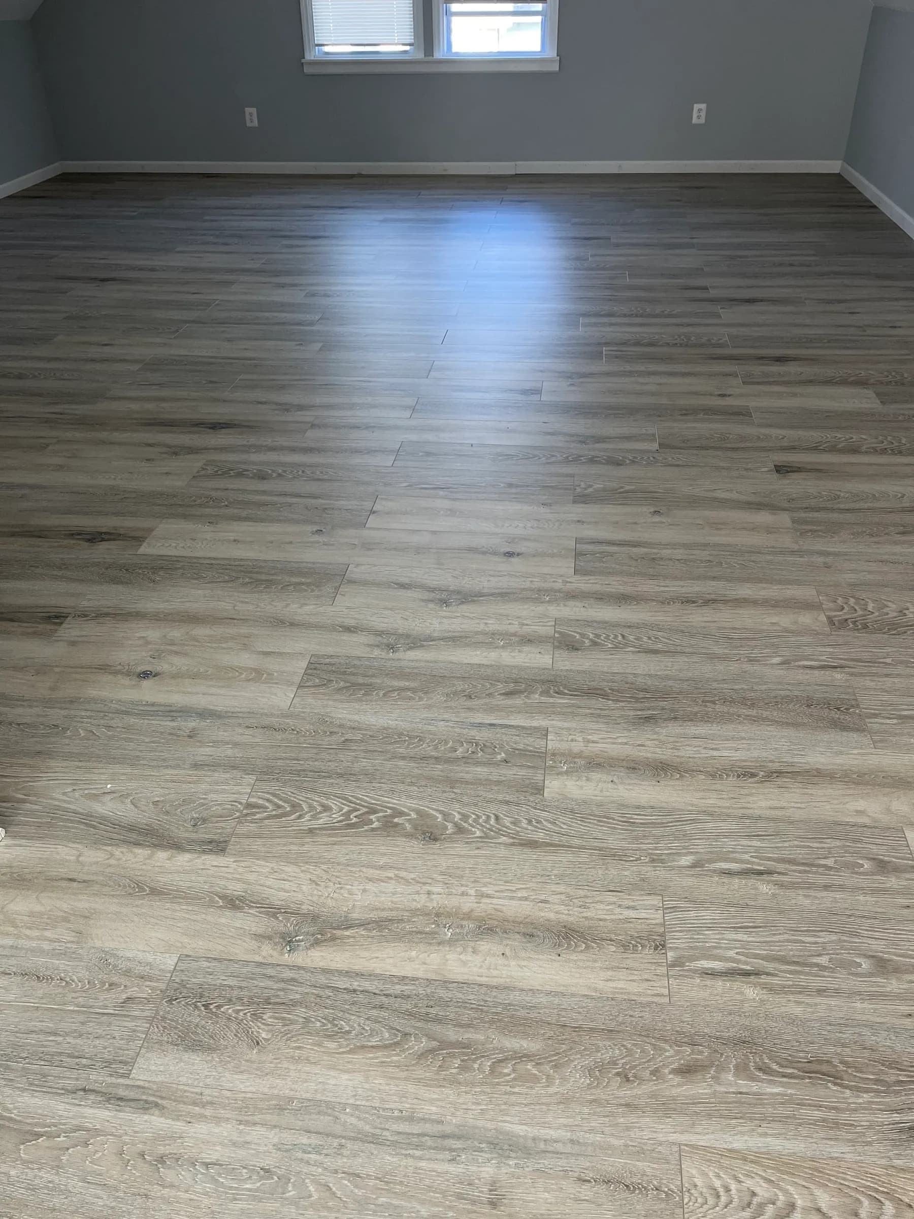 Wood-plank flooring close-up with natural light