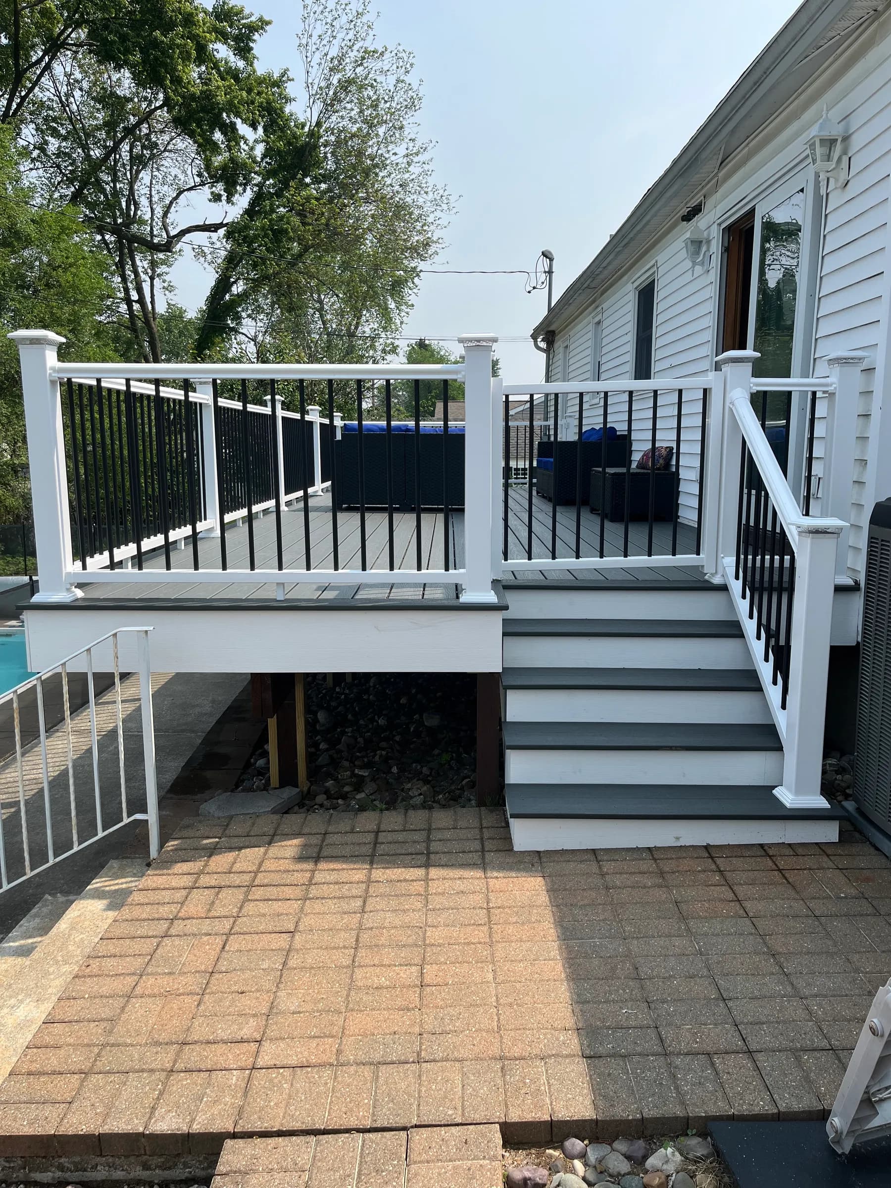 White staircase tower with black balusters